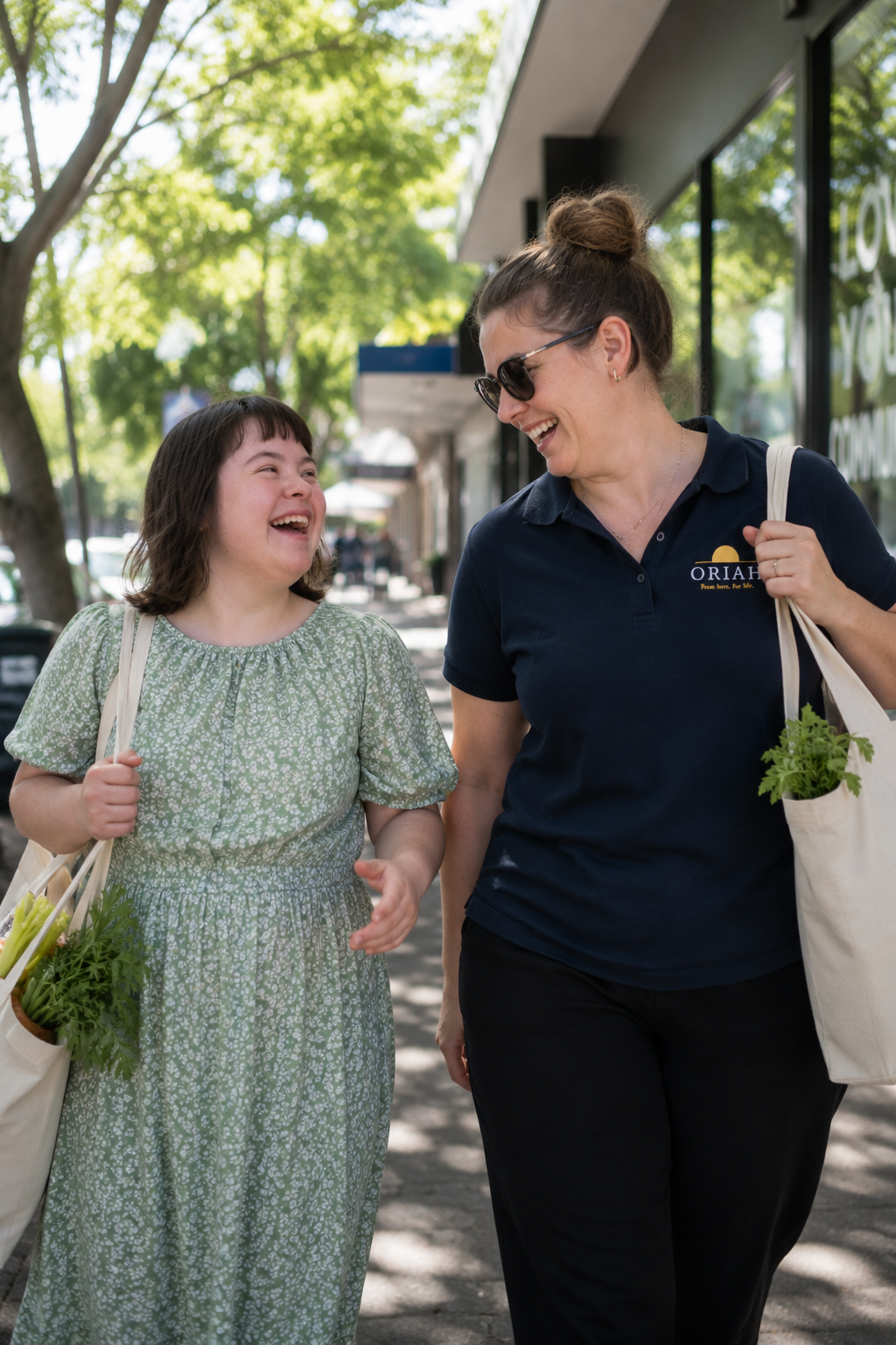 Participant and support worker enjoying a community outing